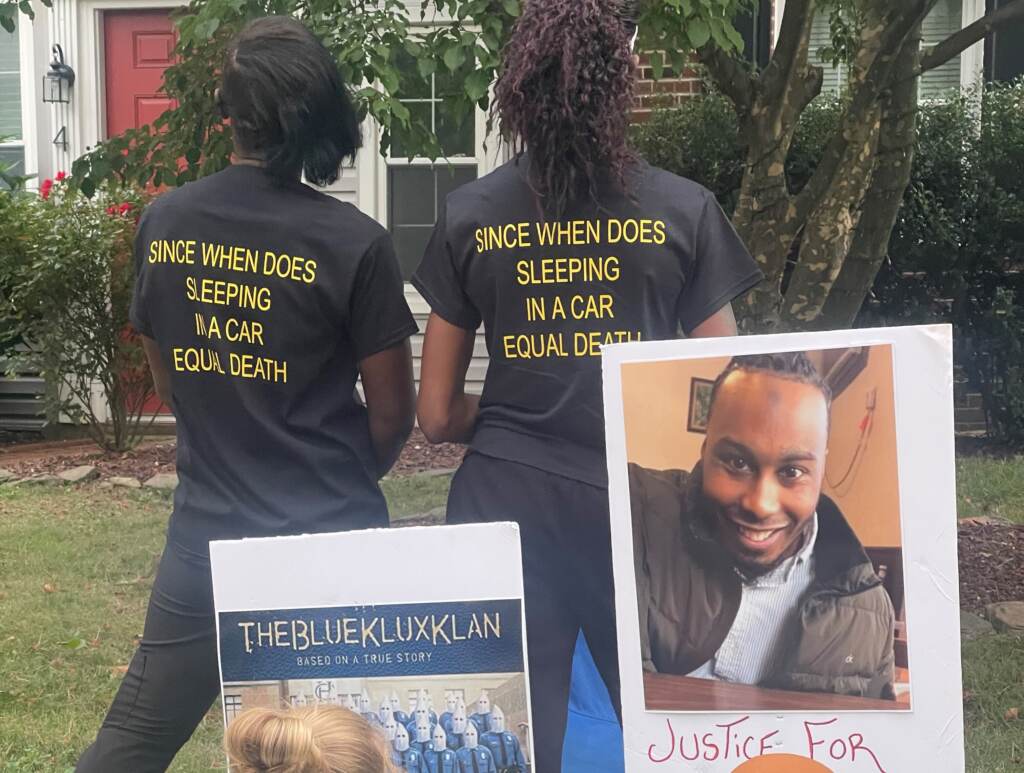 protest denney. Protesters have been outside prosecutor Mark Denney's house three times in recent weeks. (Courtesy of Keandra Ray)