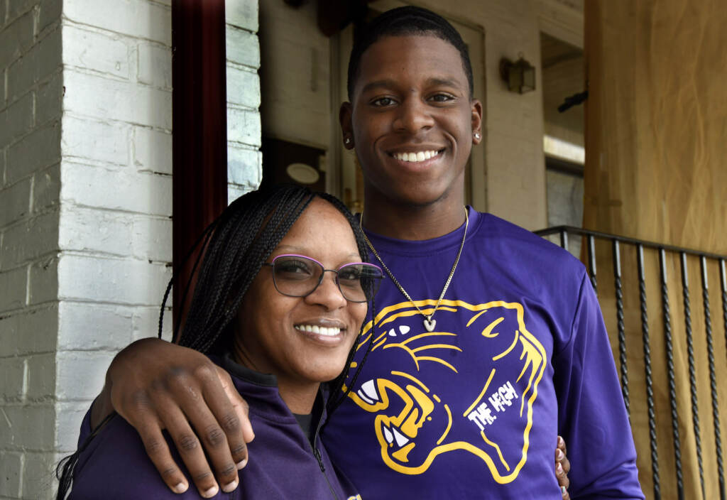 01 Danielle Carter and her son Vance Carter outside their Camden home