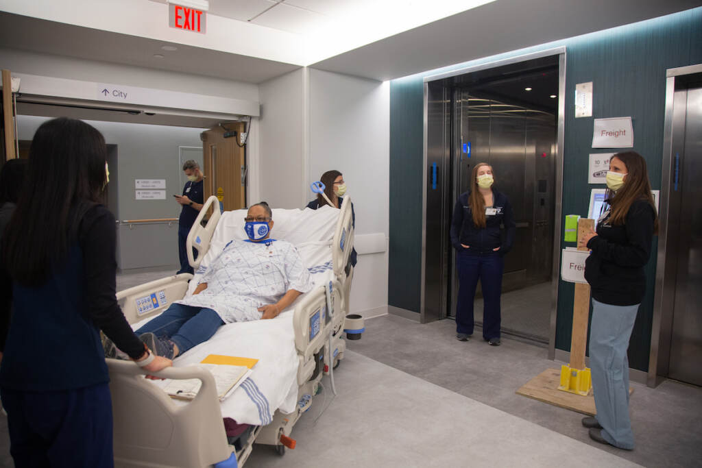 10142021-hospital of the university of pennsylvania-dress rehearsal- new pavilion building-emilycohen (12 of 13) A team of medical professionals rehearse how to bring a mock patient in a care bed to another floor during a dress rehearsal of different patient scenarios in the new Pavilion building at the Hospital of the University of Pennsylvania