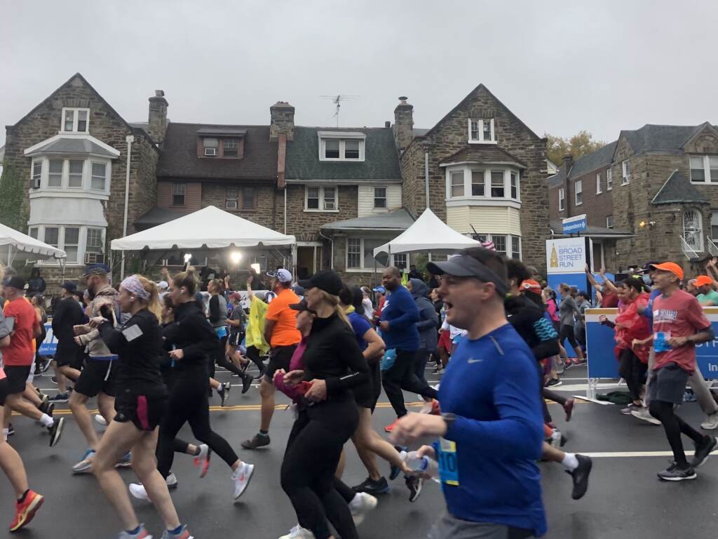 10MFBROAD_Race1 Runners take off at the start of at the start of the Broad Street Run. Participants had to provide proof of vaccination. (Mallory Falk, WHYY)
