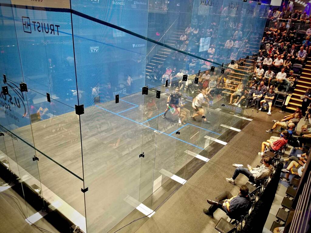 Glass competition courts are designed to optimize audience viewing, as well as television and live-streaming cameras