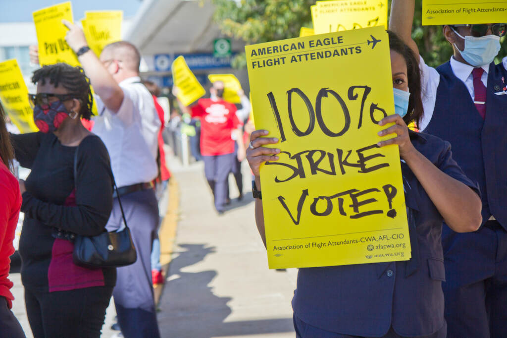 2021 10 21 k paynter airport picket piedmont flight attendants-4 Workers hold up yellow signs at a protest outside PHL Airport