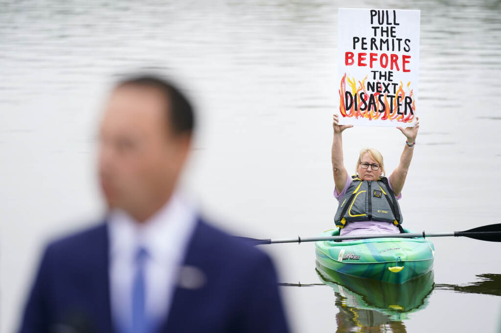 Election 2022-Governor-Pennsylvania-Shapiro Libby Madarasz displays a protest placard against a pipeline
