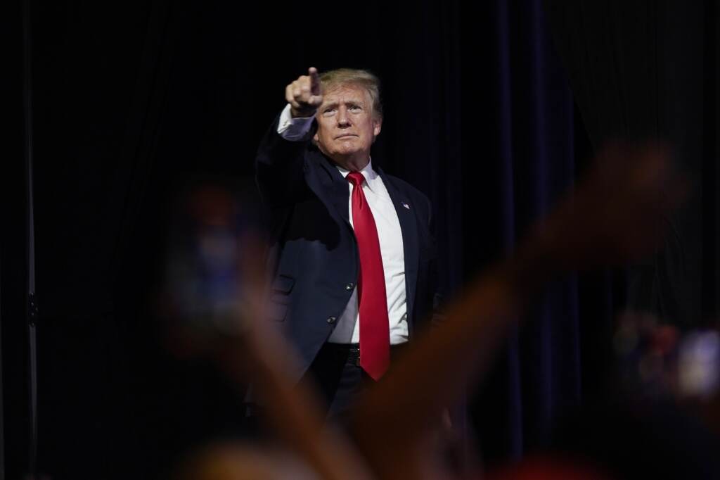 Facebook Papers Trump Violence Donald Trump points to supporters in a crowd
