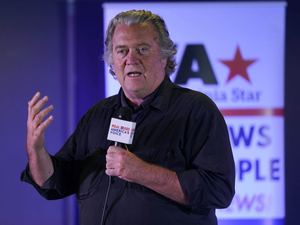 Steve Bannon gestures during a speech