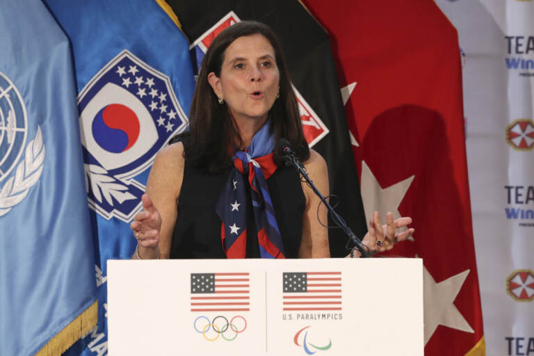 In this Aug. 1, 2017, file photo, U.S. Olympic Committee chief marketing officer Lisa Baird speaks about the Team USA WinterFest for the upcoming 2018 Pyeongchang Winter Olympic Games, at Yongsan Garrison, a U.S. military base in Seoul, South Korea
