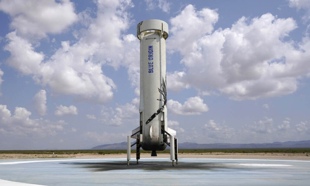 FILE - Blue Origin's New Shepard rocket sits on the landing pad after carrying passengers Jeff Bezos, founder of Amazon and space tourism company Blue Origin, brother Mark Bezos, Oliver Daemen and Wally Funk, from its spaceport near Van Horn, Texas on July 20, 2021