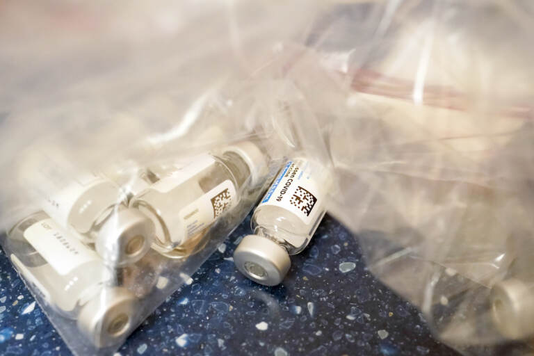 Empty vials of the Johnson & Johnson's one-dose COVID-19 vaccine are seen at the Vaxmobile, at the Uniondale Hempstead Senior Center, Wednesday, March 31, 2021, in Uniondale, N.Y.