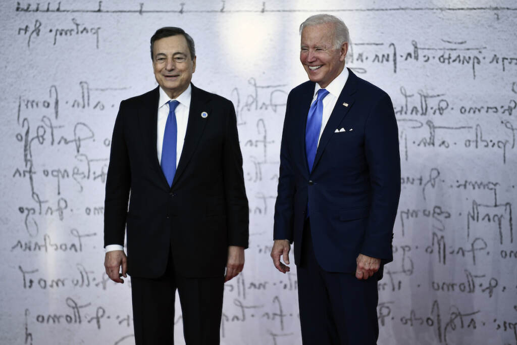 Italy G20 Summit Italy's Prime Minister, Mario Draghi (L) greets US President Joe Biden as he arrives for the G20 of World Leaders Summit on October 30, 2021 at the convention center