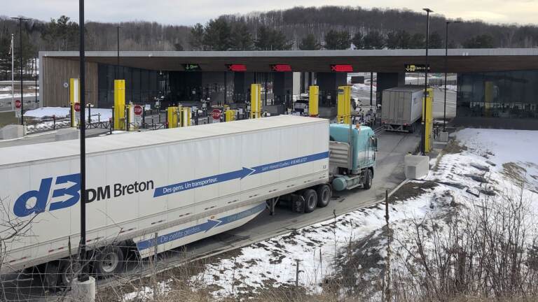 Truck traffic from Canada waits to cross the border