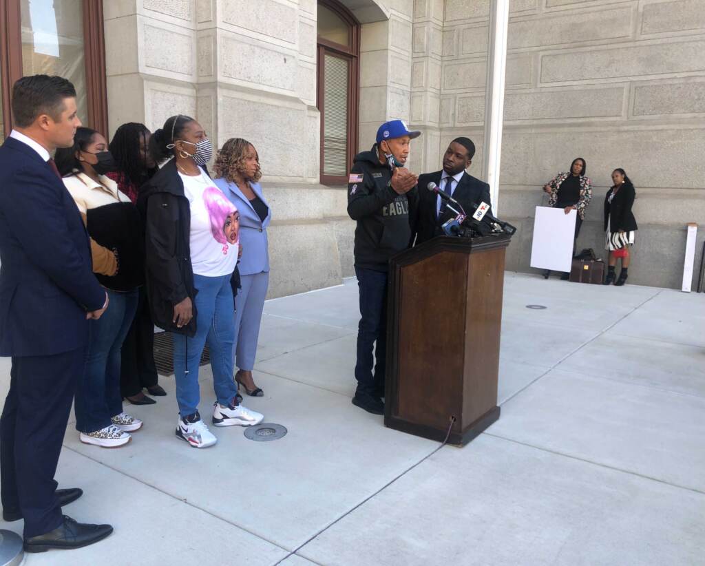 Walter Walter Jr. wrongful death lawsuit, Oct. 28, 2021 (1) Family members stand with Attorney Shaka Johnson (right) and Councilmember Gautier (center) at a press conference regarding the court settlement in the wrongful death of Walter Wallace Jr