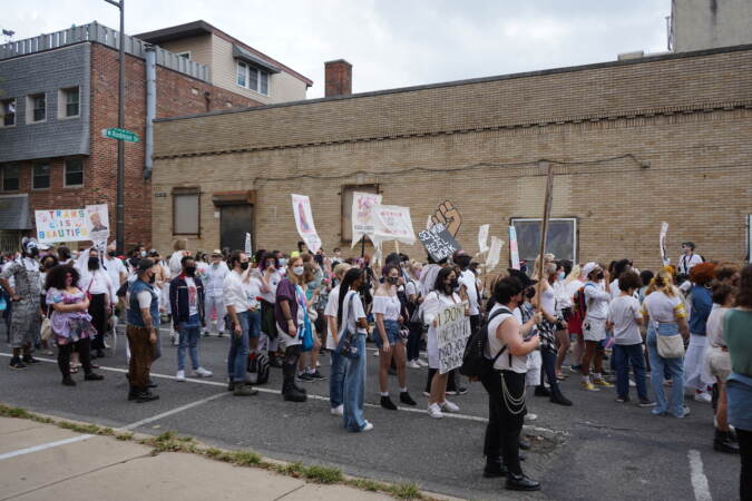 The marchers stopped several times during the duration of the march to hear the speakers share their stories