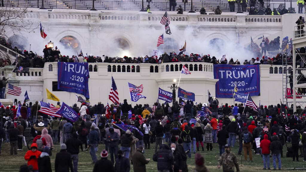 Protesters storm the Capitol on Jan. 6. Protesters storm the Capitol on Jan. 6. (John Minchillo/AP)