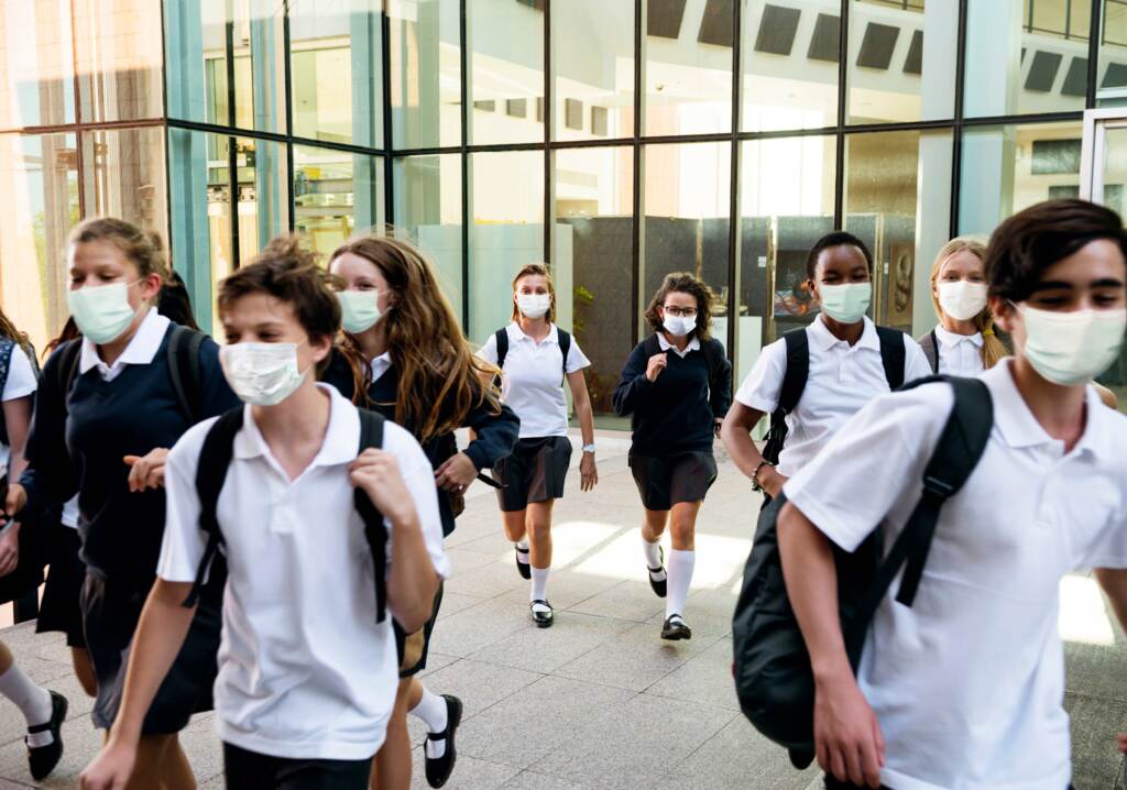 bigstock-High-school-students-wearing-m-402754031-web High school students wearing masks on their way home