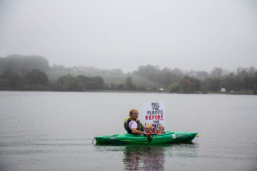 Libby Madarasz kayaks while protesting the Mariner East pipeline