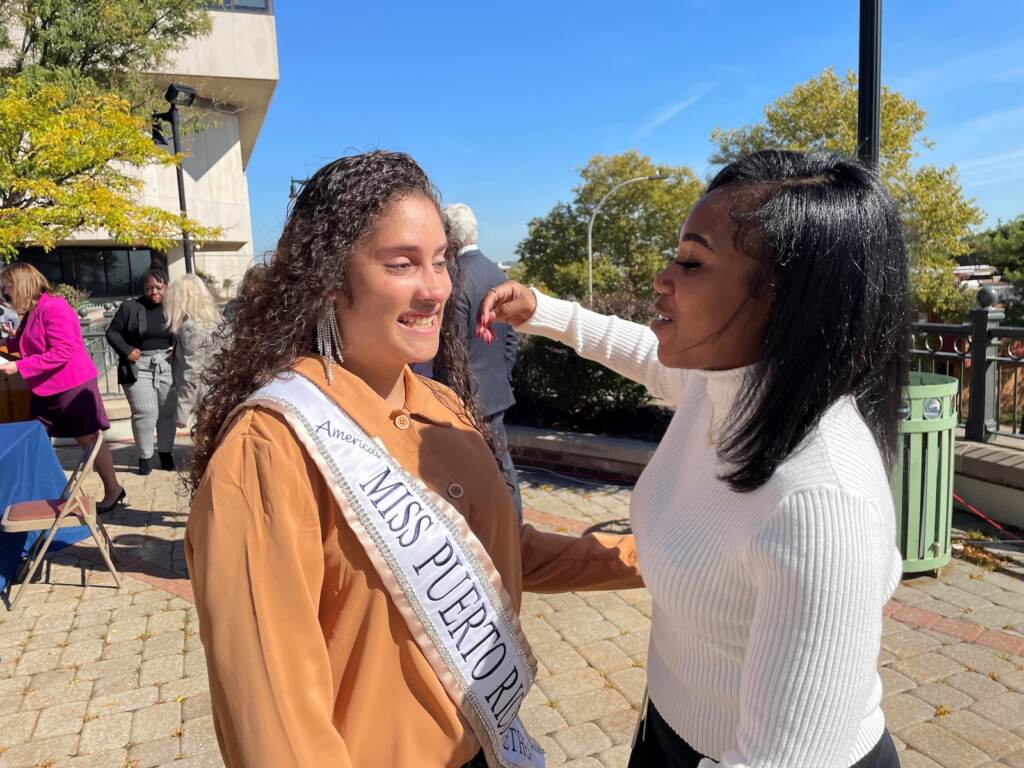 mayda and Daykia Former foster kids Mayda Berrios (left) and Daykia McKnight were all smiles after the bill to pay all college costs was signed into law. (Cris Barrish/WHYY)