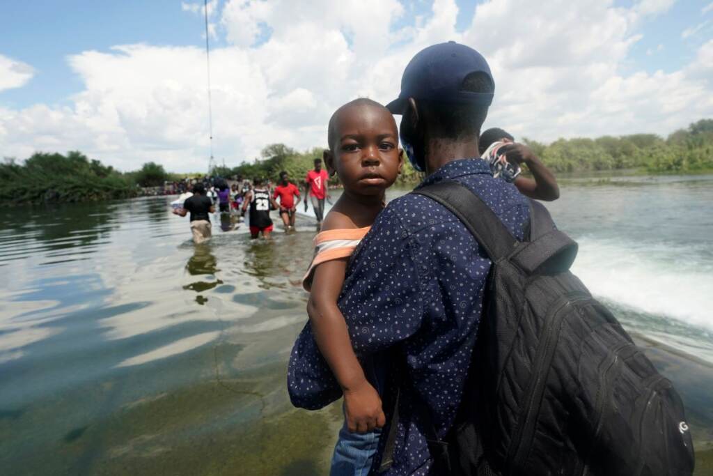 migrants Haitian migrants use a dam to cross into and from the U.S. from Mexico, Saturday, September 18, 2021. (AP Photo/Eric Gay)