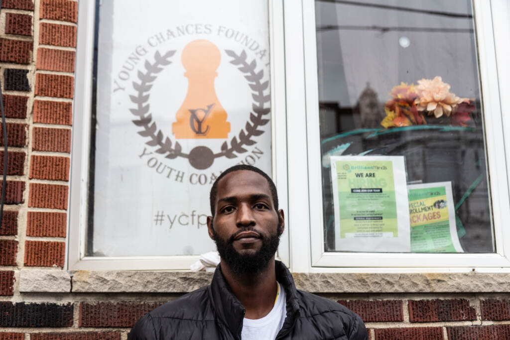 Tyrique Glasgow stands outside a building in Philly