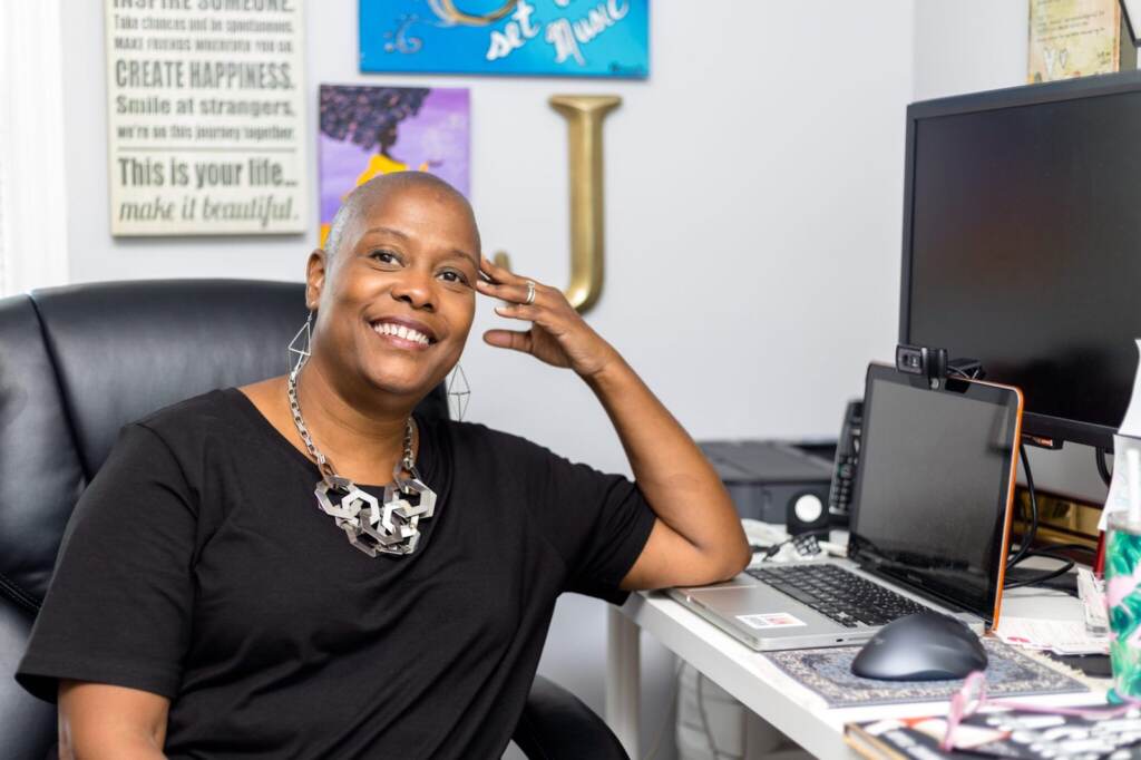 1.-A-relaxed-Joyel-Crawford-46-in-her-home-office_-in-Haddon-Township-2048×1365 A relaxed Joyel Crawford, 46, in her home office in Haddon Township, NJ. (Photo by Tezarah Wilkins)