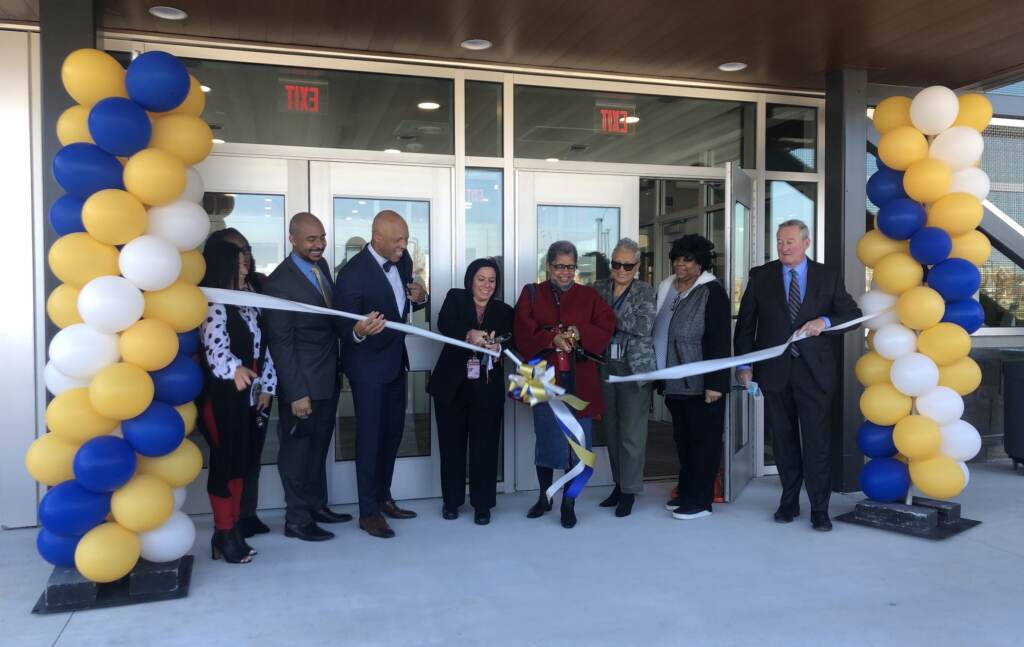 Superintendent William Hite, Mayor Jim Kenney, Solis-Cohen principal Michelina Serianni, and school district officials celebrate the new building with a ribbon cutting ceremony. (Emily Rizzo WHYY)