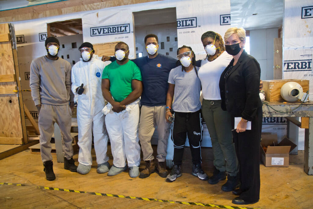United States Energy Secretary Jennifer Granholm poses with ECA (Energy Coordinating Agency) trainees in Philadelphia’s Kensington neighborhood