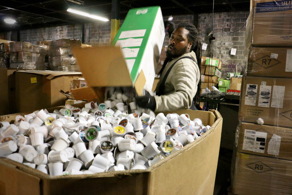 Raheem Boone sorts coffee K-cups