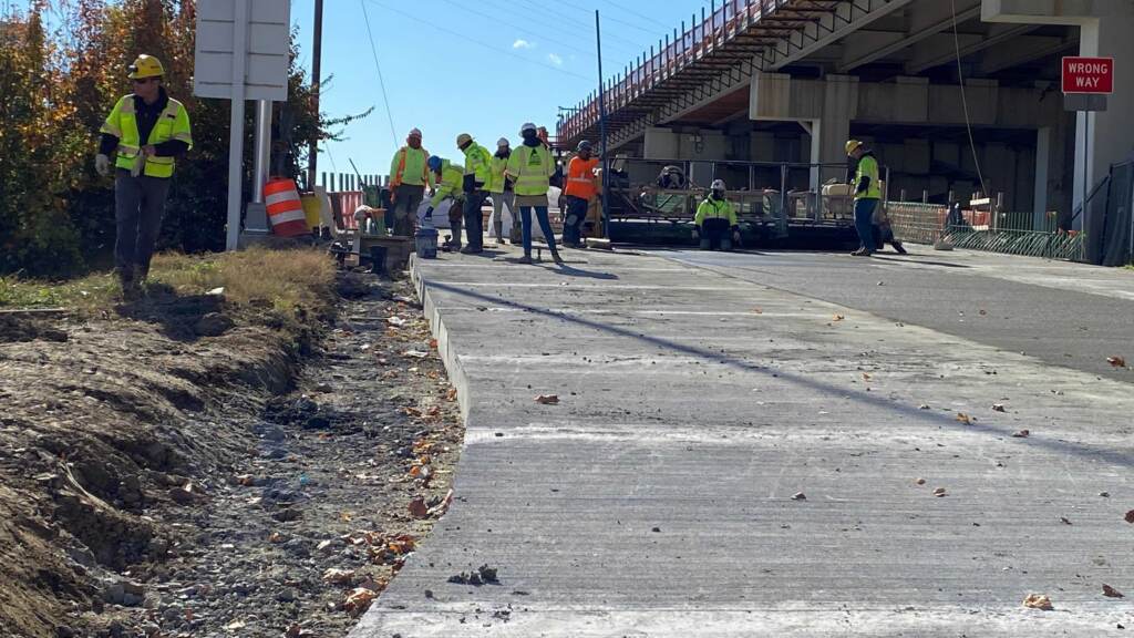 2021-11-24-m-eichmann-delaware-i95-construction Construction workers rebuild an I-95 off ramp on the city of Wilmington as part of the massive 'Restore the Corridor' interstate project through the city. (Mark Eichmann/WHYY)