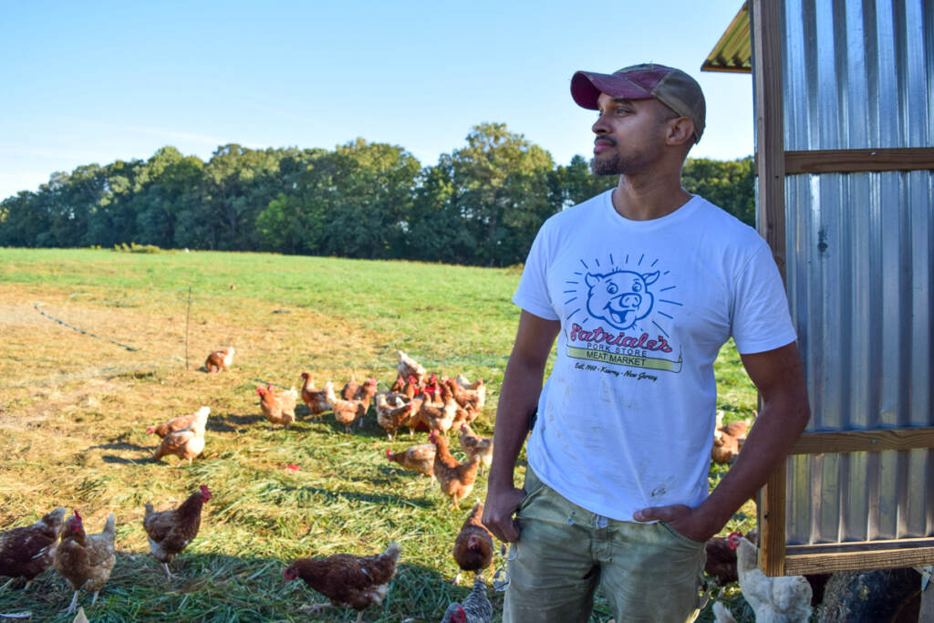 Chris Newman of Sylvanaqua Farms Chris Newman started a farm to raise chickens and pigs sustainably, with plenty of outdoor space. He'd also like the food to be affordable. (Alan Yu/WHYY)