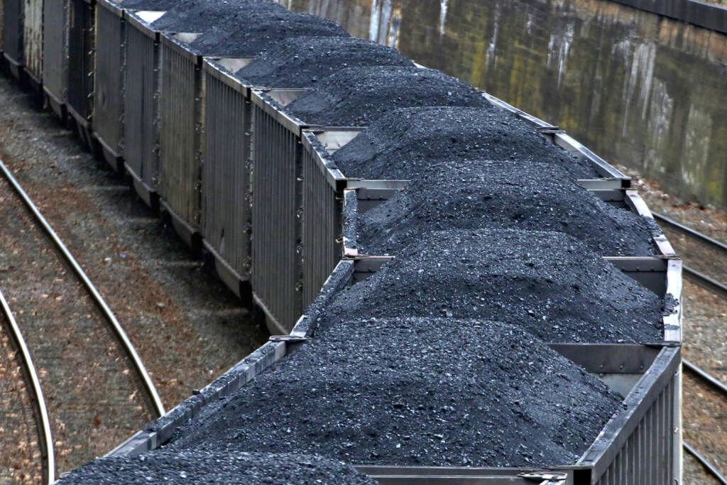 Climate-Company Impact Hold for Business Photo-- Swayne Hall--A Norfolk Southern freight train hauling coal makes it way through downtown Pittsburgh Thursday, Jan. 26, 2017. (AP Photo/Gene J. Puskar)
