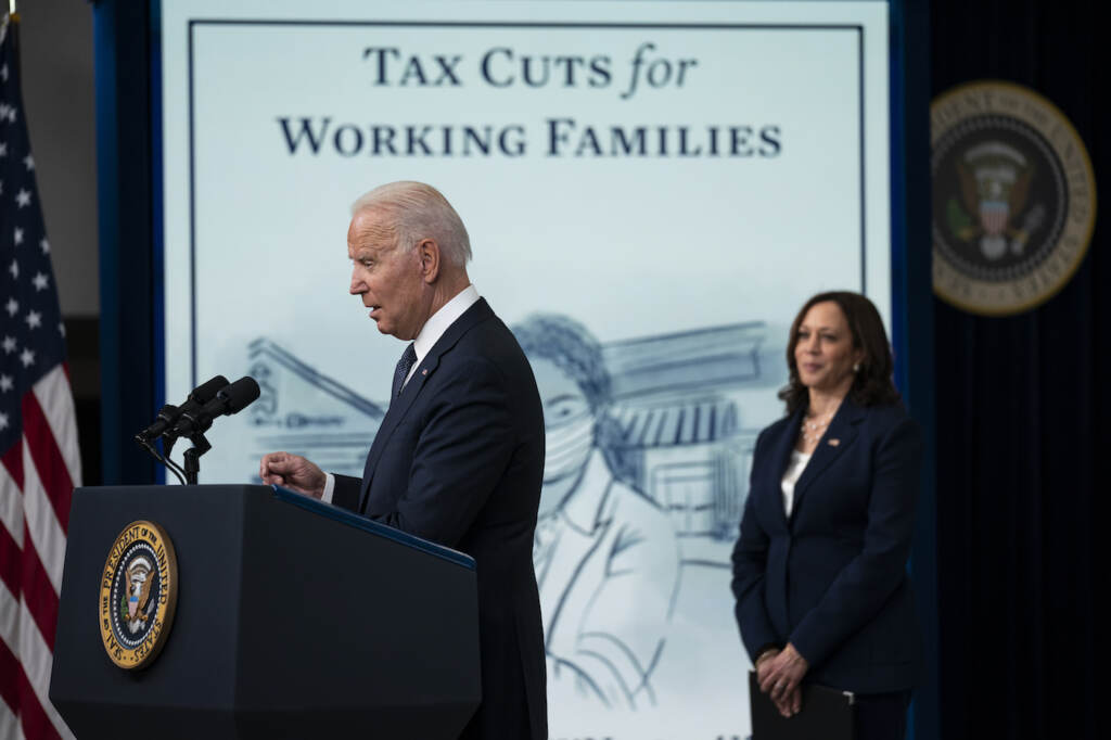 Joe Biden, Kamala Harris Vice President Kamala Harris listens as President Joe Biden speaks during an event to mark the start of monthly Child Tax Credit relief payments, in the South Court Auditorium on the White House complex, Thursday, July 15, 2021, in Washington. (AP Photo/Evan Vucci)