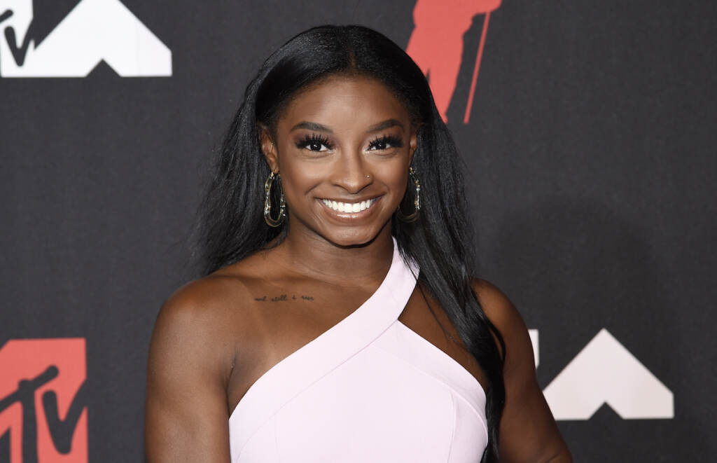 Simone Biles Simone Biles smiles on the red carpet