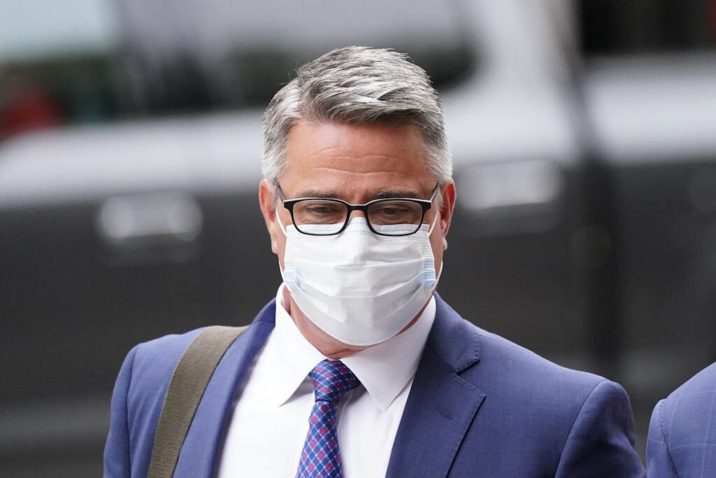 Philadelphia Union Boss Indictment Bobby Henon walks while wearing a face mask