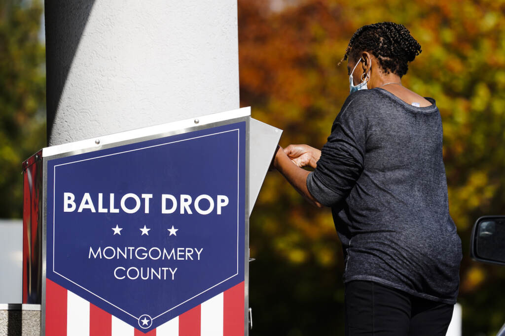 Election 2021 Pennsylvania A person drops off a mail-in ballot at an election ballot return box in Willow Grove, Pa., Monday, Oct. 25, 2021.