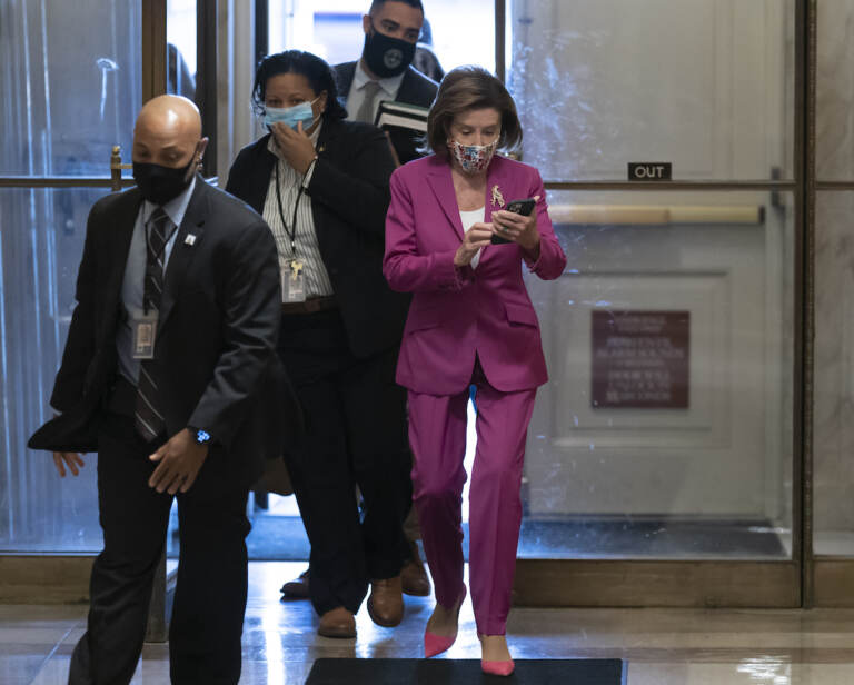 Speaker of the House Nancy Pelosi, D-Calif., arrives to lead Democrats in advancing President Joe Biden’s $1.85 trillion-and-growing domestic policy package, at the Capitol in Washington, Friday, Nov. 5, 2021. The hard-fought social policy and climate-change legislation will still have to clear the 50-50-Senate, where revisions are likely and Biden has no votes to spare