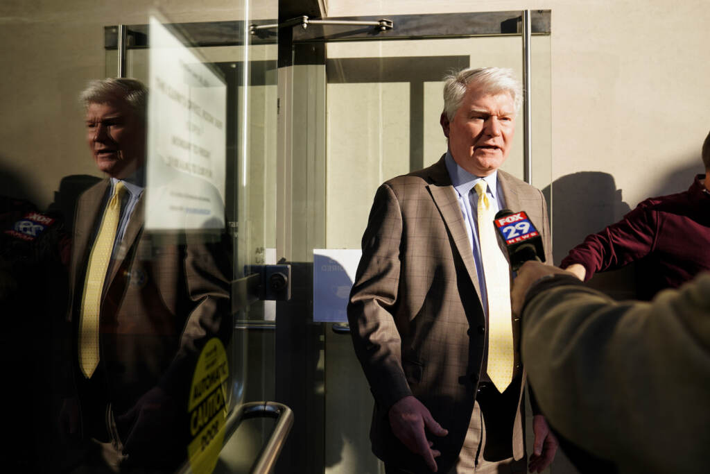 John ''Johnny Doc'' Dougherty speaks with members of the media