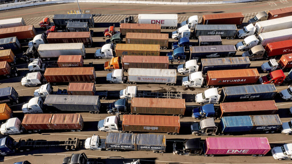 US Supply Shortage Surging Demand Trucks line up to enter a Port of Oakland shipping terminal on Wednesday, Nov. 10, 2021, in Oakland, Calif. I(AP Photo/Noah Berger)