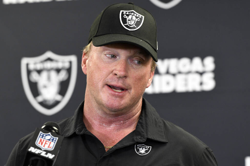 Gruden-NFL Lawsuit Footbal FILE - In this Sept. 19, 2021, file photo, Las Vegas Raiders head coach Jon Gruden meets with the media following an NFL football game against the Pittsburgh Steelers in Pittsburgh. Gruden is out as coach of the Raiders after emails he sent before being hired in 2018 contained racist, homophobic and misogynistic comments. A person familiar with the decision said Gruden is stepping down after The New York Times reported that Gruden frequently used misogynistic and homophobic language directed at Commissioner Roger Goodell and others in the NFL