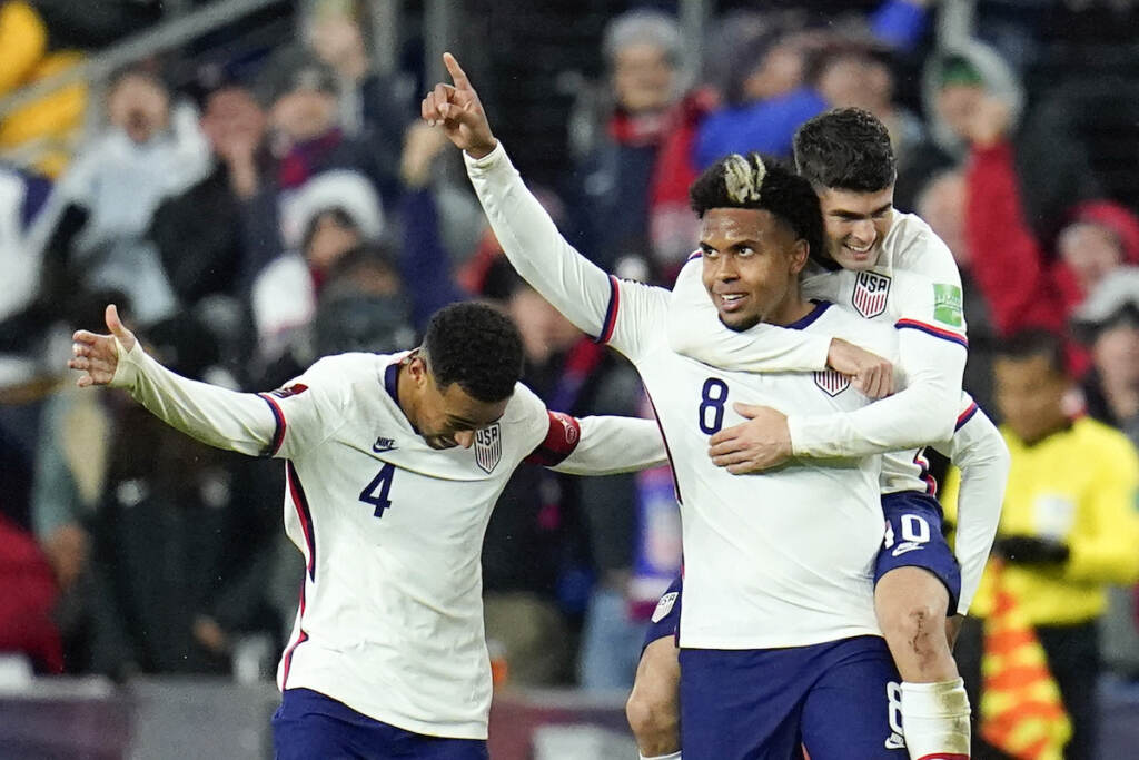 APTOPIX WCup Mexico US Soccer United States' Weston McKennie celebrates his goal with Tyler Adams, left, and Christian Pulisic during the second half of a FIFA World Cup qualifying soccer match against Mexico, Friday, Nov. 12, 2021, in Cincinnati. The U.S. won 2-0