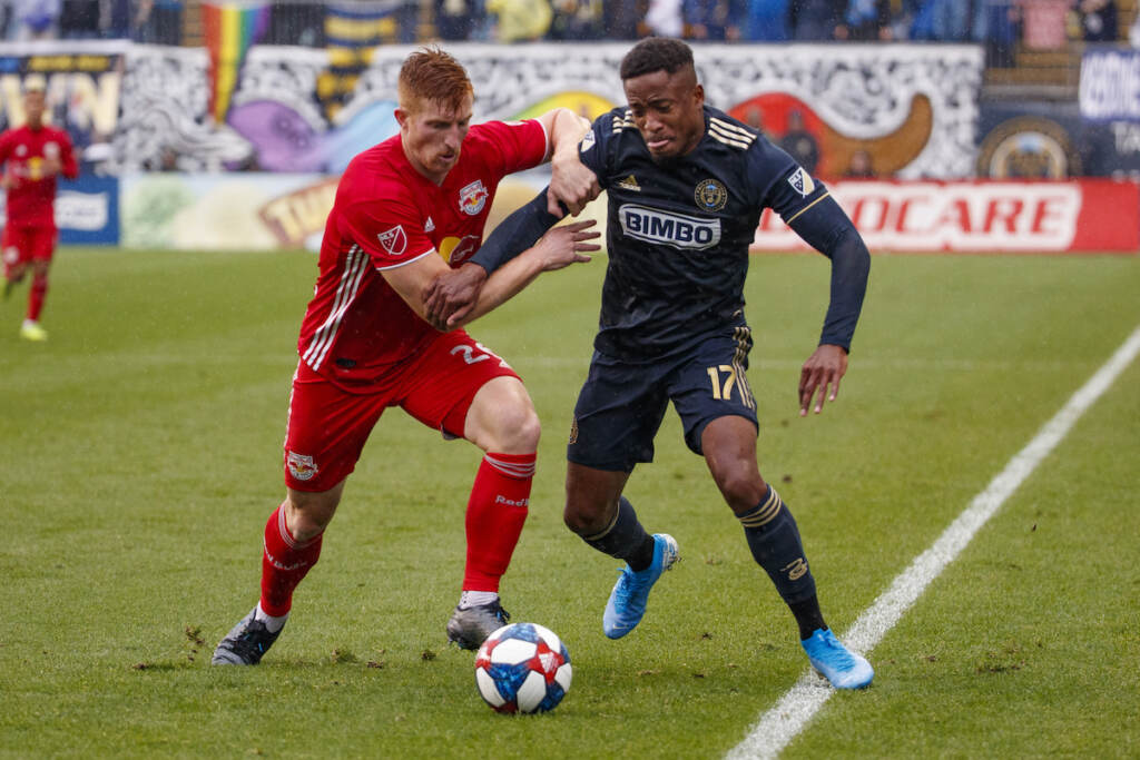 MLS Cup Playoffs Soccer File photo: Philadelphia Union's Sergio Santos, right, and New York Red Bulls' Tim Parker, left, battle for the ball during first half of an MLS soccer Eastern Conference first-round playoff match, Sunday, Oct. 20, 2019, in Chester, Pa. The last time the Philadelphia Union faced the New York Red Bulls to open the Major League Soccer playoffs was not so long ago, in 2019. And it was memorable — especially for the Union