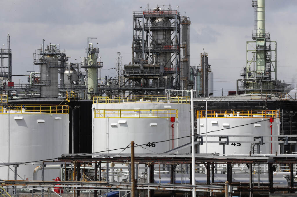 Biden Gas Prices Storage is shown at the Marathon Petroleum Corp. refinery in Detroit, Tuesday, April 21, 2020. The world is awash in oil, there's little demand for it and we're running out of places to put it. That in a nutshell explains this week's strange and unprecedented action in the market for crude oil futures contracts, where traders essentially offered to pay someone else to deal with the oil they were due to have delivered next month.(AP Photo/Paul Sancya)