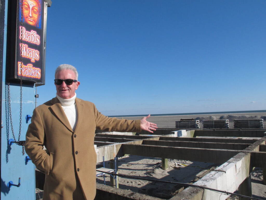 Wildwood Boardwalk Repairs In this Nov. 19, 2021 photo, Wildwood N.J. Mayor Pete Byron gestures toward a section of the Wildwood, N.J. boardwalk that is being rebuilt. The popular seaside town is repairing or rebuilding most of its century-old boardwalk over the next five years