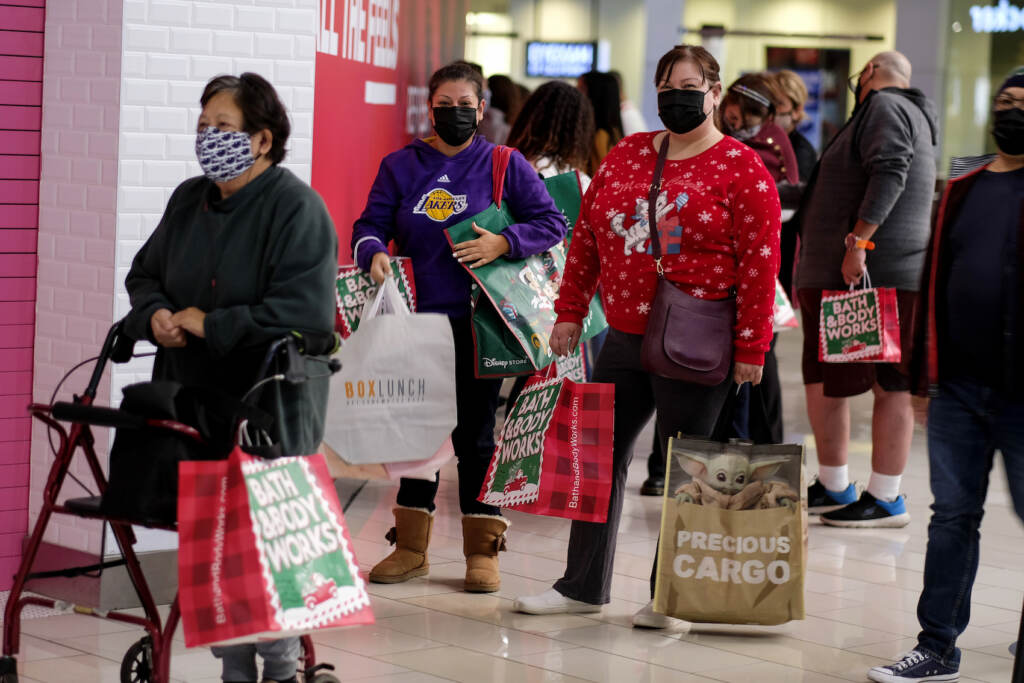 Black Friday Shopping Black Friday shoppers wearing face masks wait in line to enter a store at the Glendale Galleria in Glendale, Calif., Friday, Nov. 27, 2020. (AP Photo/Ringo H.W. Chiu)