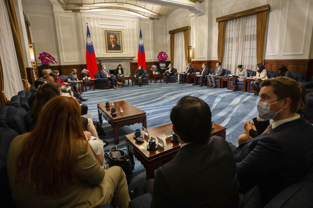 In this photo released by the Taiwan Presidential Office, U.S. Representative Mark Takano, D-Calif. center left chats with Taiwanese President Tsai Ing-wen near other members of the U.S. delegation at the Presidential Office in Taipei, Taiwan on Friday, Nov. 26, 2021. Five U.S. lawmakers met with Taiwan President Tsai Ing-wen Friday morning in a surprise one-day visit intended to reaffirm the United States' “rock solid” support for the self-governing island