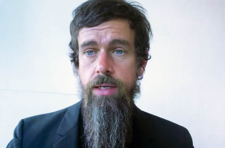 FILE - In this Wednesday, Oct. 28, 2020, file photo, Twitter CEO Jack Dorsey appears on a screen as he speaks remotely during a hearing before the Senate Commerce Committee on Capitol Hill, in Washington. Dorsey broke his silence to defend his company’s ban of President Donald Trump as the right decision, but warned that it could set a dangerous precedent. The ban, he said, revealed Twitter’s “failure” to create an open and healthy space for what Dorsey calls the “global public conversation.” (Michael Reynolds/Pool Photo via AP, File)