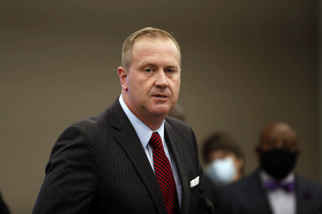 Eric Schmitt FILE - Missouri Attorney General Eric Schmitt speaks during a news conference in St. Louis on Aug. 6, 2020. A federal judge has blocked President Joe Biden's administration from enforcing a coronavirus vaccine mandate on health care workers in 10 states. The preliminary injunction issued Monday, Nov. 29, 2021, applies to a coalition of suing states. They are Alaska, Arkansas, Iowa, Kansas, Missouri, Nebraska, New Hampshire, North Dakota, South Dakota and Wyoming. (AP Photo/Jeff Roberson, File)