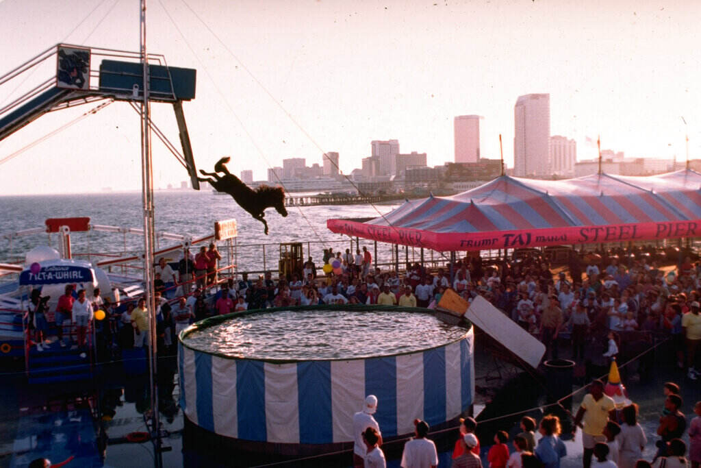 Diving Horse Scrapped A horse makes a plunge into a six-foot pool of water on the Steel Pier in Atlantic City, N.J. (AP Photo/ Charles Rex Arbogast, File)
