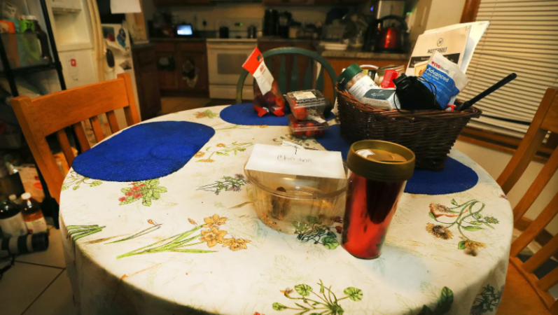 Christian left a piece of fudge and a travel mug on the kitchen table in the days before he was shot and killed. (Fred Adams for Spotlight PA)