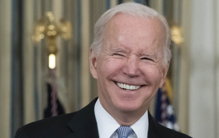 President Joe Biden smiles as he speaks about the bipartisan infrastructure bill in the State Dinning Room of the White House, Saturday, Nov. 6, 2021, in Washington. (AP Photo/Alex Brandon)
