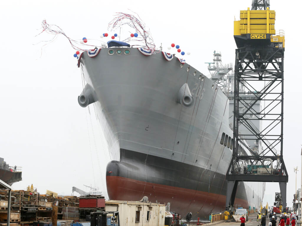 The U.S. Navy launches the USNS Harvey Milk in San Diego, Saturday, Nov. 6, 2021. The U.S. Navy launches the USNS Harvey Milk, a fleet replenishment oiler ship named after the first openly gay elected official, in San Diego, Saturday, Nov. 6, 2021. The Navy ship is the second of six vessels in the Navy's John Lewis-class program, second to the USNS John Lewis. (AP Photo/Alex Gallardo)