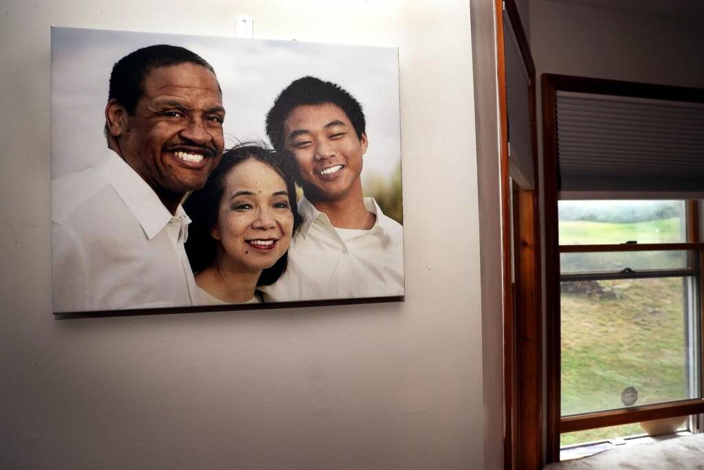 christian-hall-pa-state-police-shooting-spa-112221 A family photo hangs on a wall in the dining room